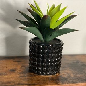 Faux plant in black vase. Very lightly used for temporary display. Like new.